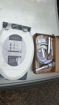 Brand new white elongated, toilet seat, brand new kitchen faucet with drain and supply lines