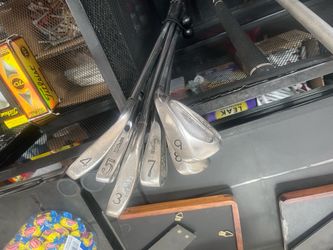 2 sets of golf irons