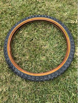 1980s Mitsubishi Silver Star Comp III tire in used conditions. Yellow label.