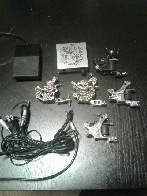 5 Tattoo machines (liners) , 1 power supply , 1 foot pedal and 2 clip cords