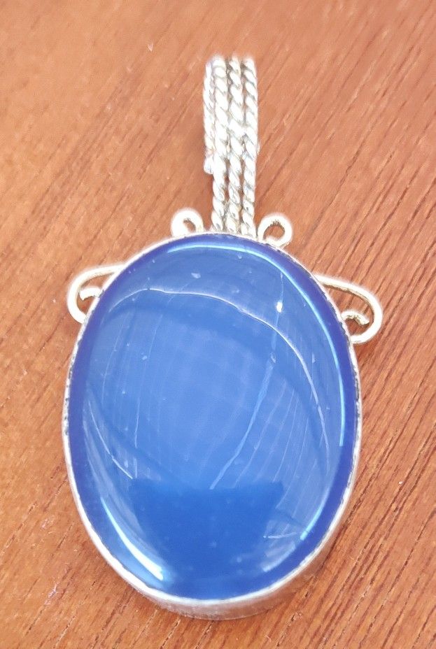 Blue Opal Cabochon Pendant In .925 Sterling Silver Setting 