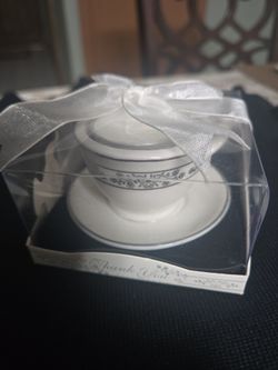 SMALL TE CUP W/ CANDEL . BRAND NEW.