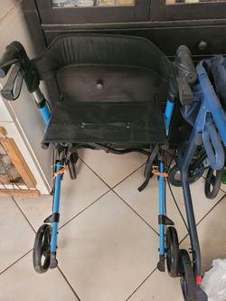 Blue Frame walker with seat