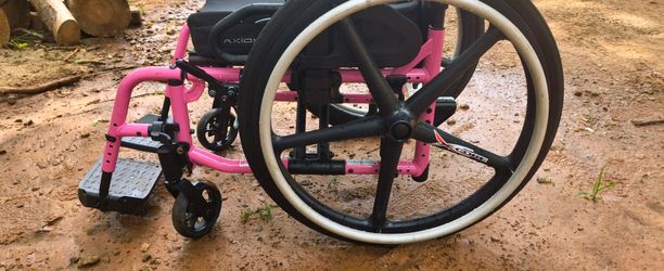 Complete Ki Mobility Catalyst Ultralight Wheelchair – Custom Pink (With Cushion & Footrests)