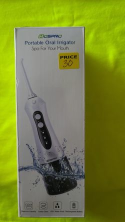 PORTABLE ORAL IRRIGATOR