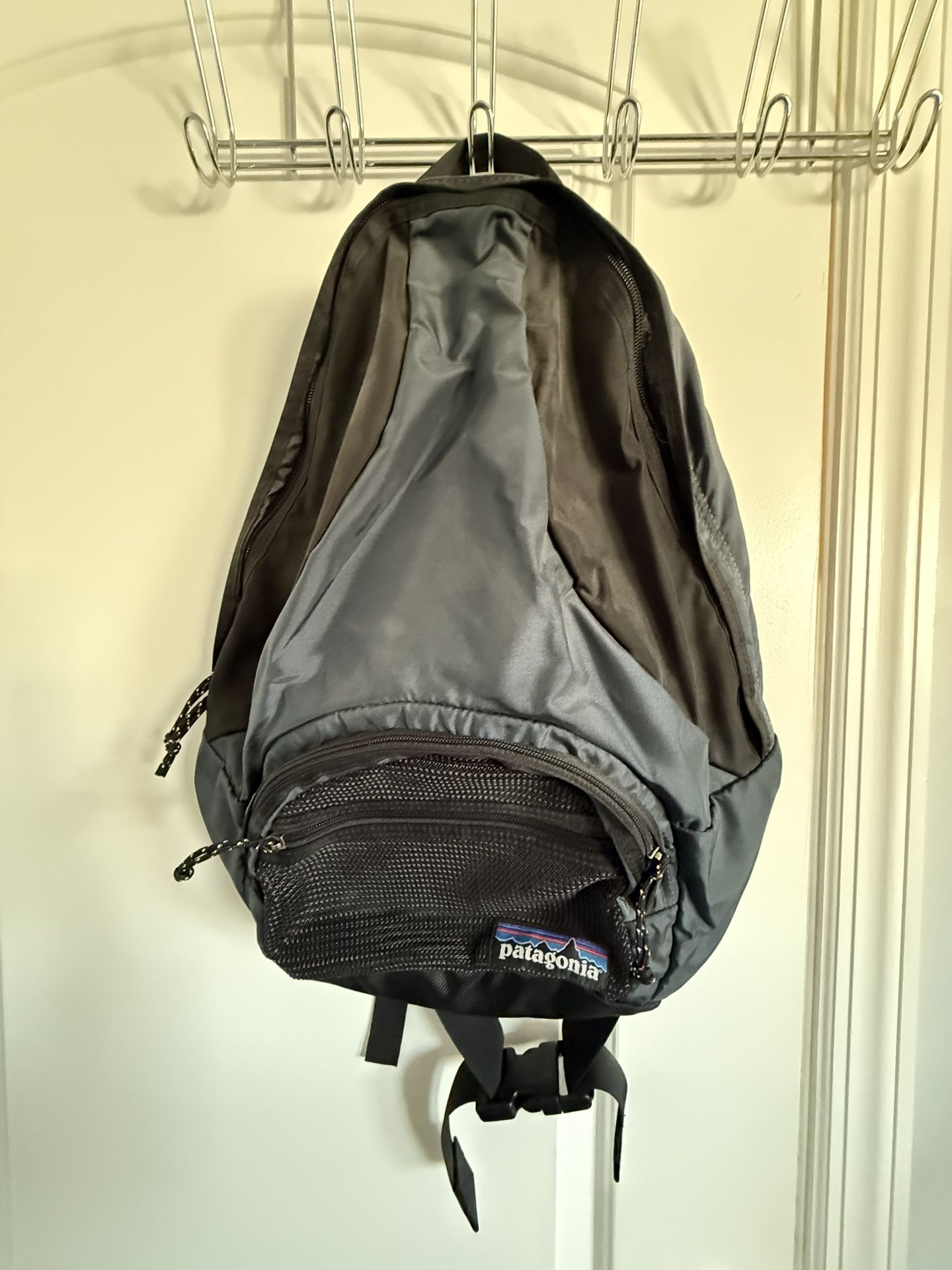 Lightweight grey and black backpack by Patagonia