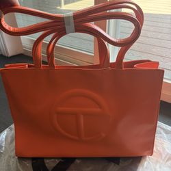 Telfar Bright Orange Embossed Logo Tire