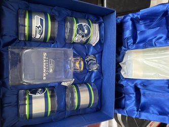 the officially licensed Seattle Seahawks Five-Piece Decanter and Glasses Set