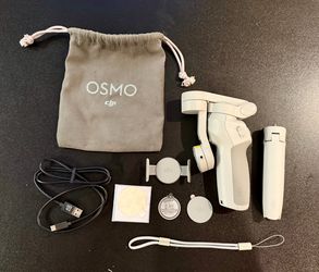 DJI OM 4   (Smartphone Stabilizer)