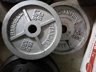 Weights; two 35lb Olympic weights $2 per lb -$140