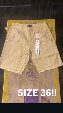 PURPLE SHORTS SIZE 36