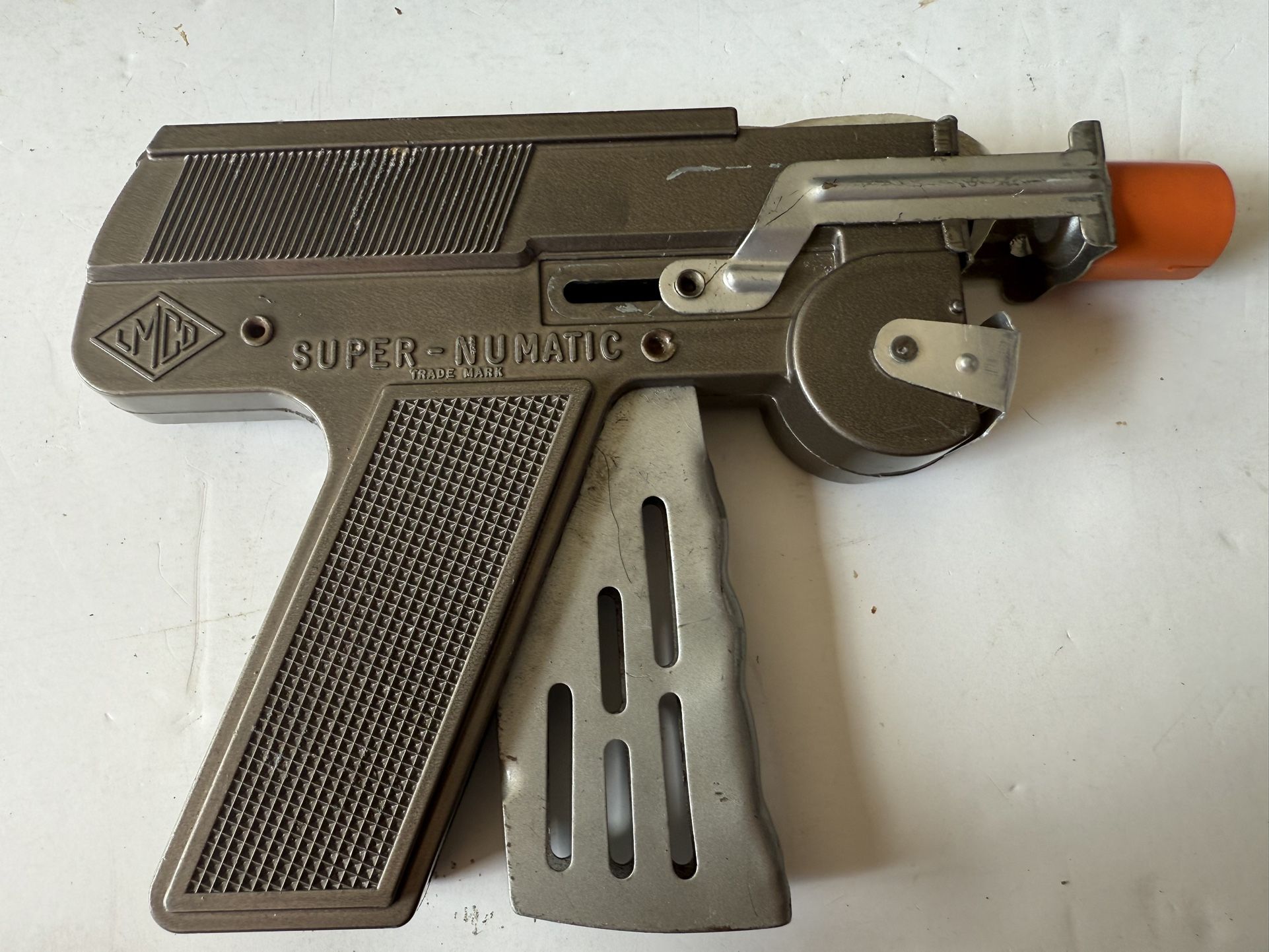 VINTAGE LMCO Super-Numatic Harmless Paper Buster Gun Cap Pistol Toy