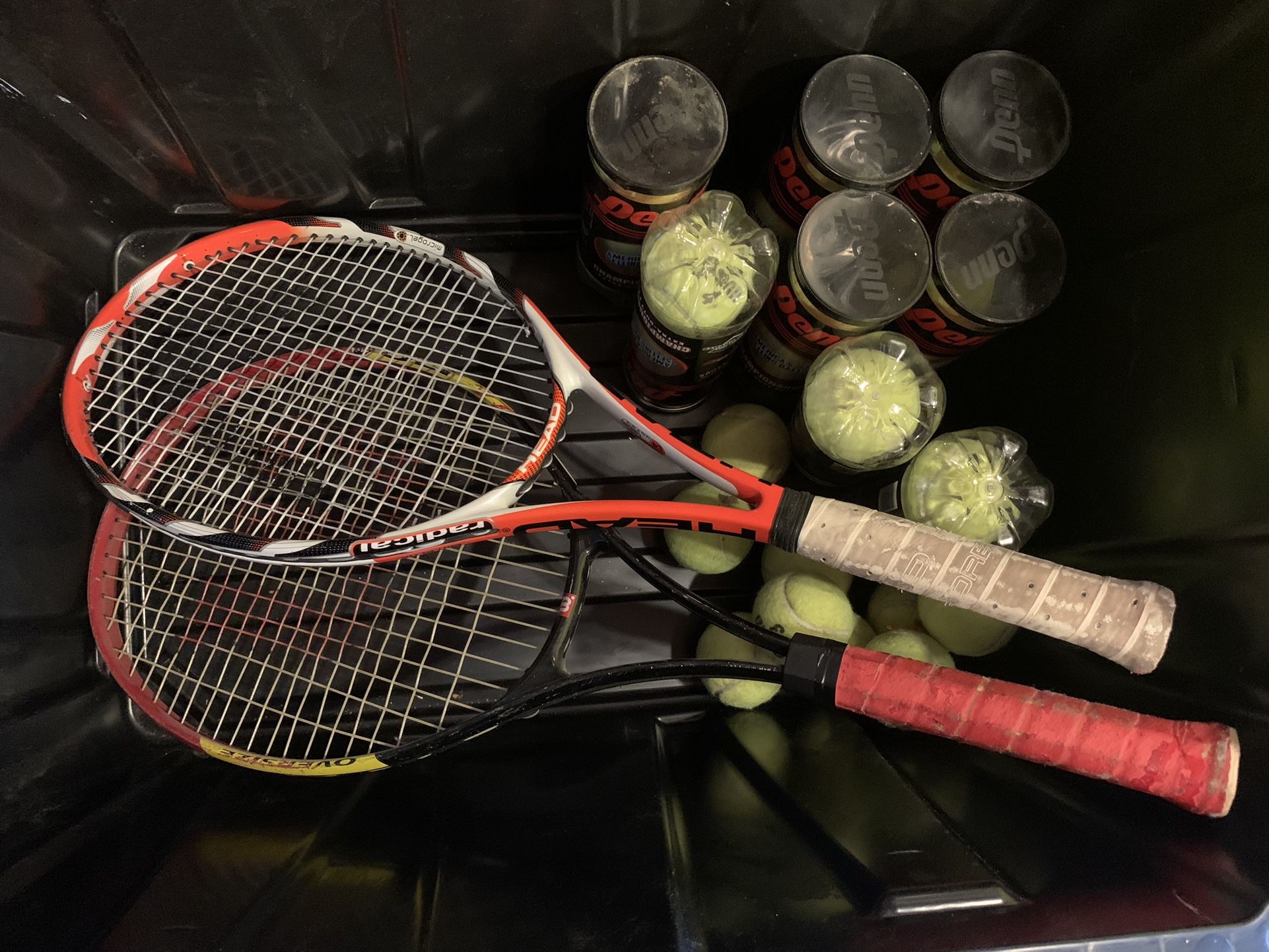 tennis rackets and balls