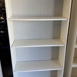 White Bookcase 9.5X30X67.5 $40 Gilbert And Ray Rd. Check All Pics And Offers.