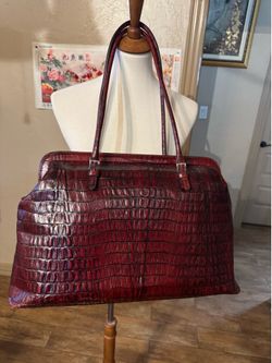Wilson, leather carry-on