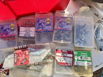 Assortment of nails Screws and fasteners in various sizes nails for wood and nails for metal anchor and nails in I
