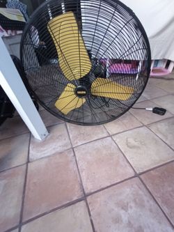 High flow wall mount oscillating fan