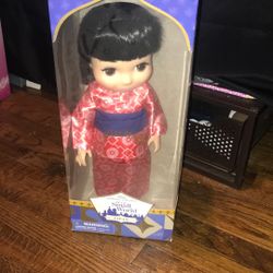 Disney it’s a small word Japan doll
