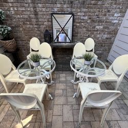 Kartell Victoria design S+ARK ghost white patio chairs and 4 iron tables