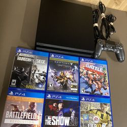 Play Station 4 PS4 Slim 1TB Comes With All The Wires Controller And 6 Cool Games Ready To Play