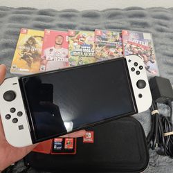 Nintendo Switch Oled + Accessories 