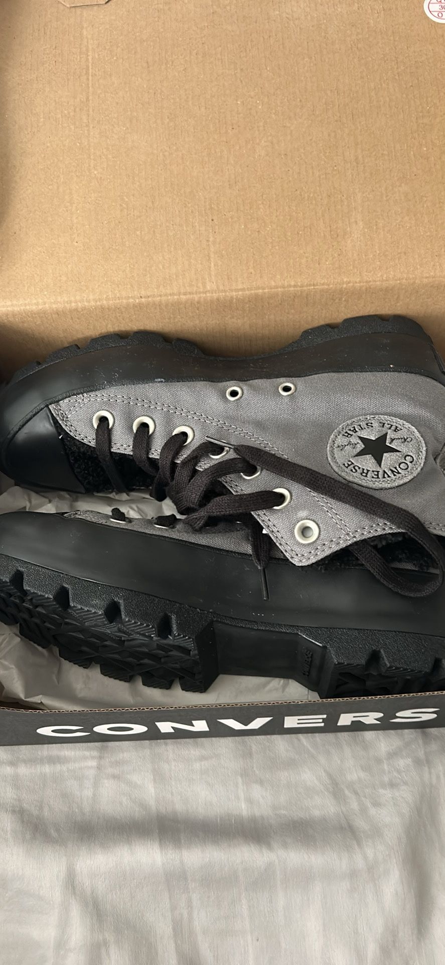 Converse chuck taylor shoes with warm fuzzy in lay and soul.