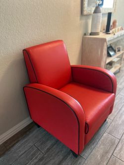 Red lounge chair from rooms to go