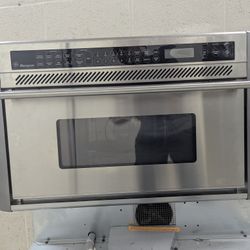 GE Monogram Stove and Microwave.