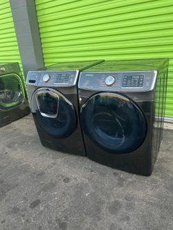 Washer and dryer samsung black stainless