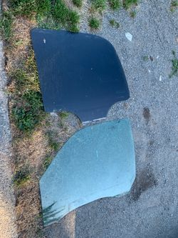 GMC Yukon driver side window glass