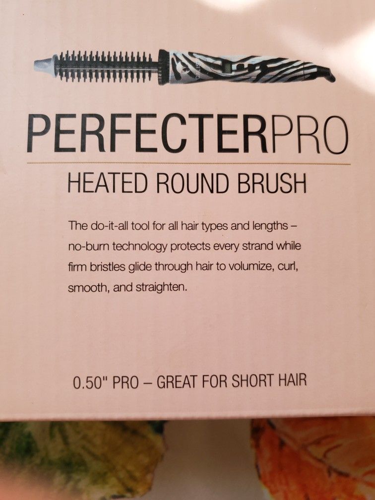 New In Box...heated Hair Brush 