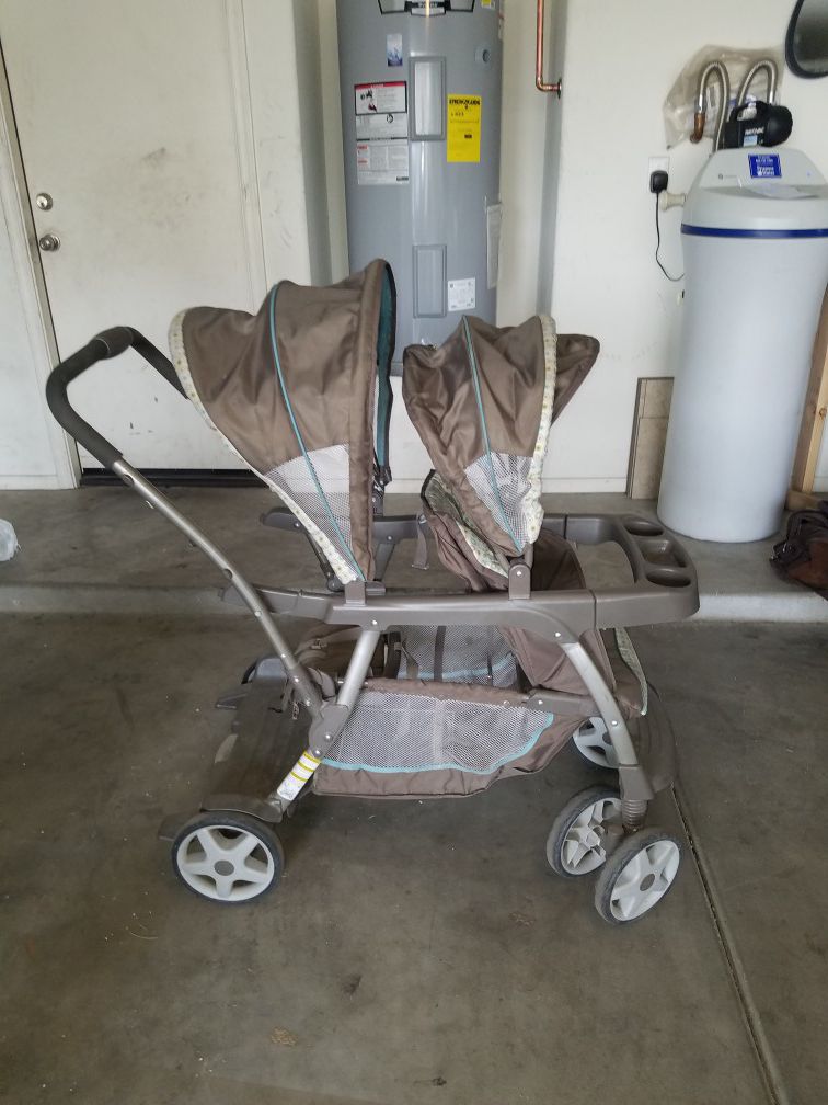 Double stroller that converts to sit and stand