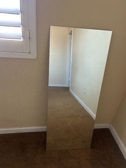 Full length frameless mirror