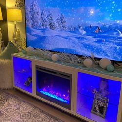 Electric Fireplace Tv Stand New in Original Packaging With Remote Control and Advanced Features Accommodating TVs up to 70”.