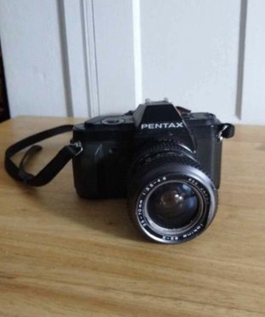 Camera
Pentax P3n p30 With Lens 
52 Japan Tokina lens 35-70mm szx