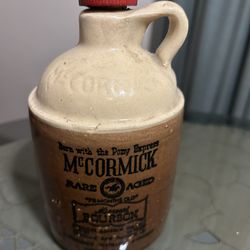 Small McCormick Aged Missouri Bourbon Glass Jar