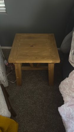 2 hard wood end tables