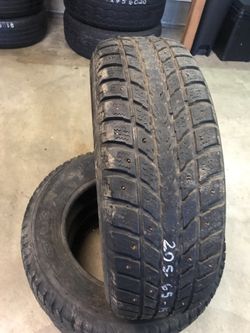 205/65/15. 3 tires only. Studded 70% tread