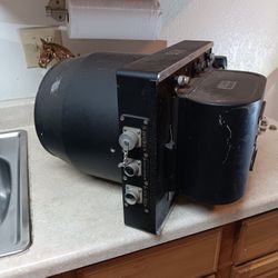 1940's or 50's old army camera that came off a air force plane back in world War ll.  20 ins long by 15 ins wide by 12 ins front to back 