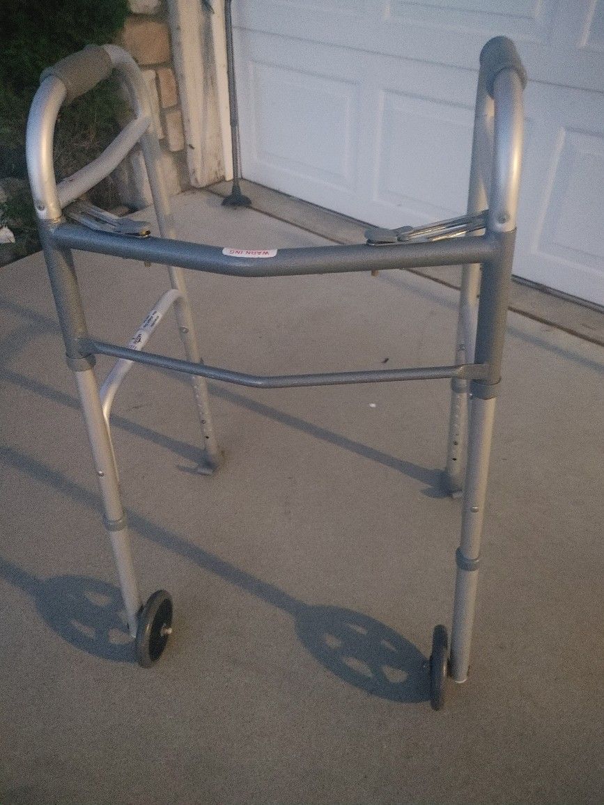 Walker With Slide Pegs