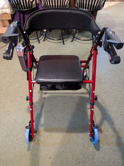NEW and assembled rollator Walker, $40 firm. ---Orig $70 with tax.