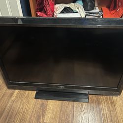37 in. Vizio flatscreen Tv: with stand, no remote. 