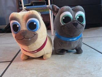 Disney pugs Bingo and Rolly