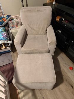 Beige Upholstered Armchair with Ottoman