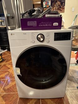 Brand New- Never Used LG 7.4 cu.ft. Front Load Dryer