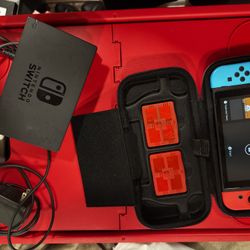 Nintendo Switch w/ Port, Cables, and Carrying Case