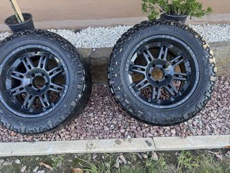 20” Black Rims & Nitto Terra Grappler Tires 305/55R20