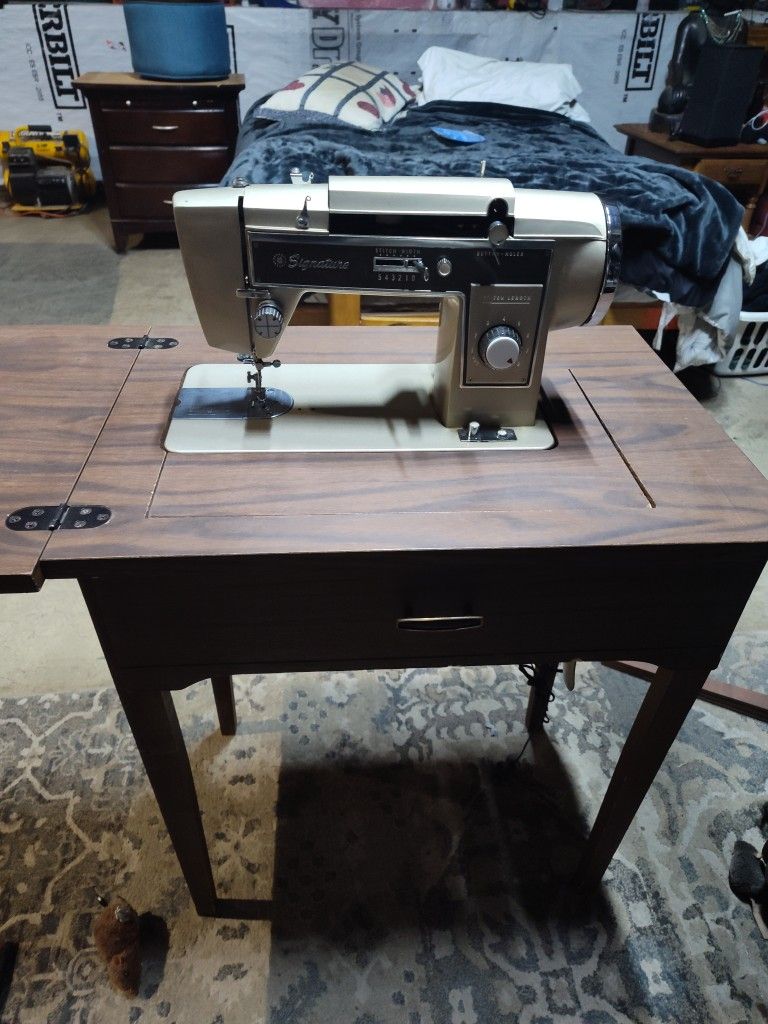 Signature  Sewing Machine And Table 