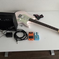 Ibanez AZ with 2 pedals/ 2 aux cables and mini amp.
