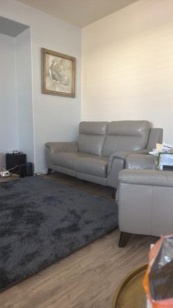 Leather  taupe color, loveseat, sofa, and two chairs they all recline